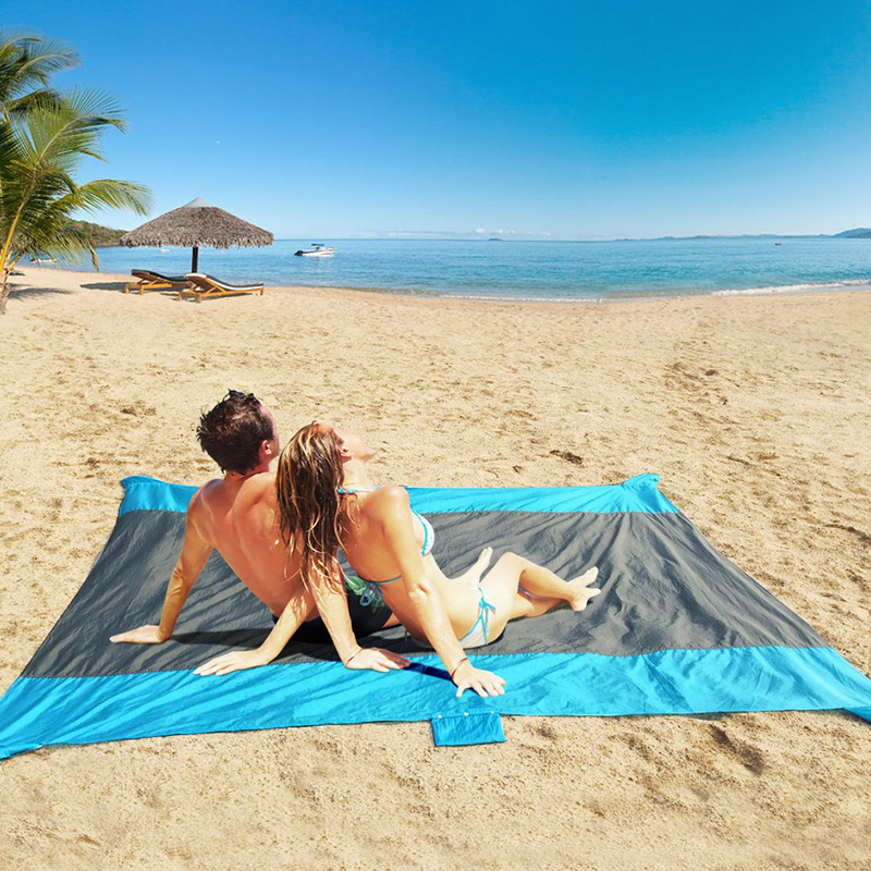 Manta de playa y tapete de picnic ligeros y resistentes a la arena para acampar al aire libre