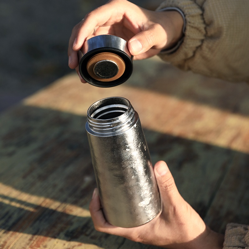 Botella antibacteriana al vacío de titanio puro de doble capa