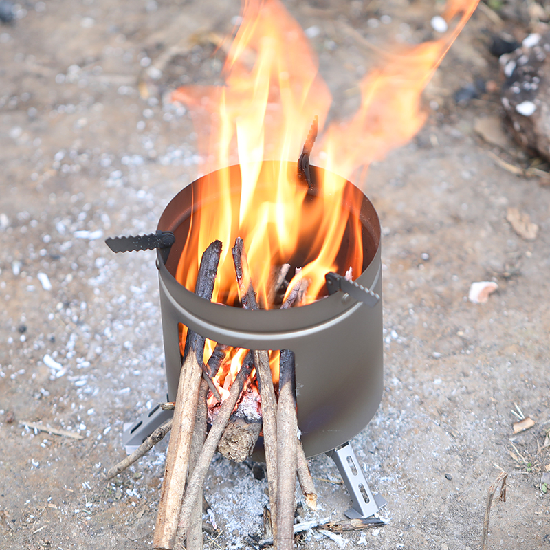 Estufa de leña de titanio para camping con soportes plegables